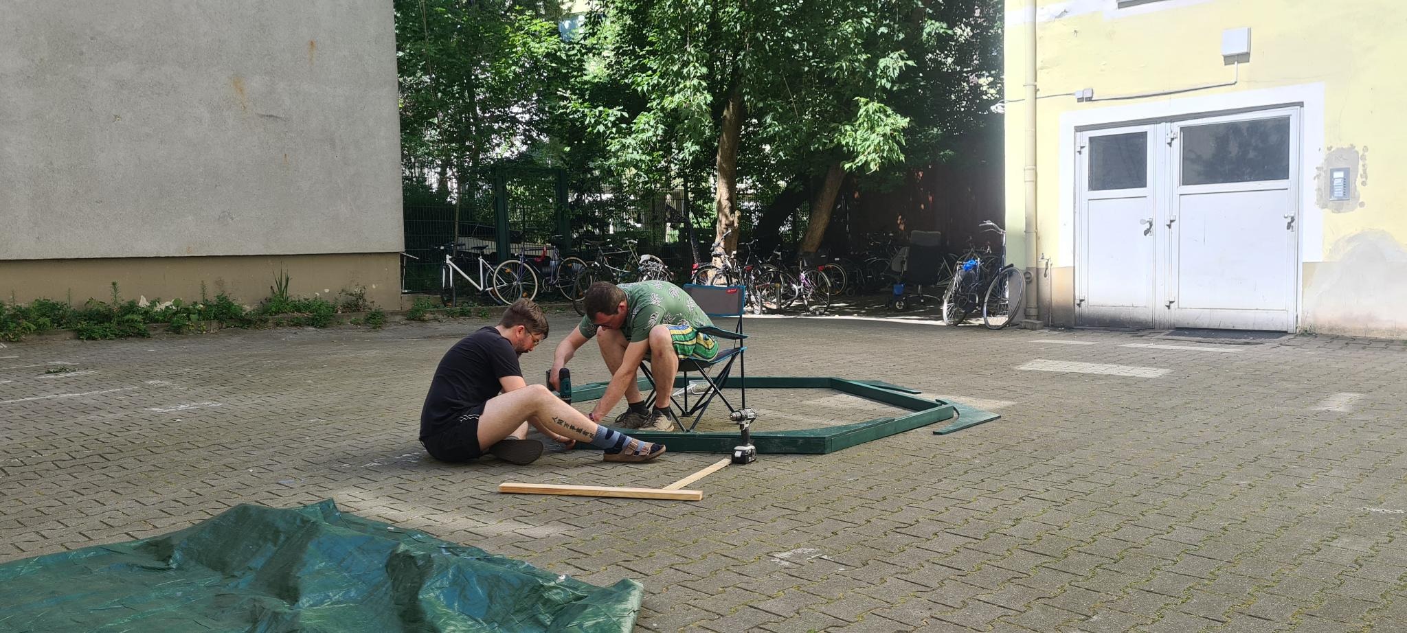 Zach and Sven assembling large hexagon
